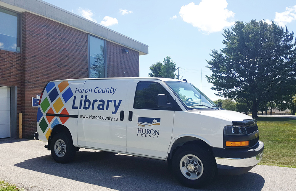 Image of the new Huron County Library van featuring the library's new branding