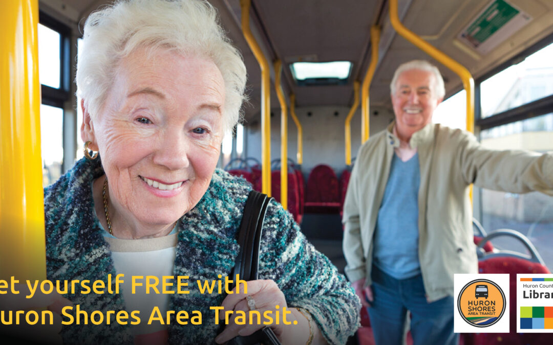 Photo of a senior woman and senior man on a bus